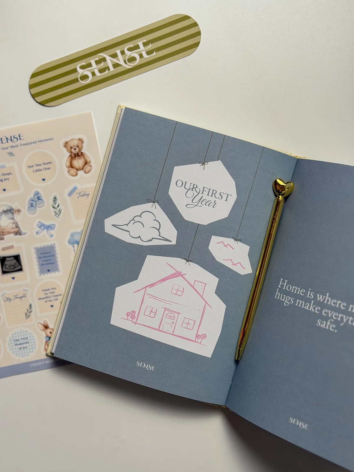 “Our First Year” spread of the English-edition baby memory book with stickers