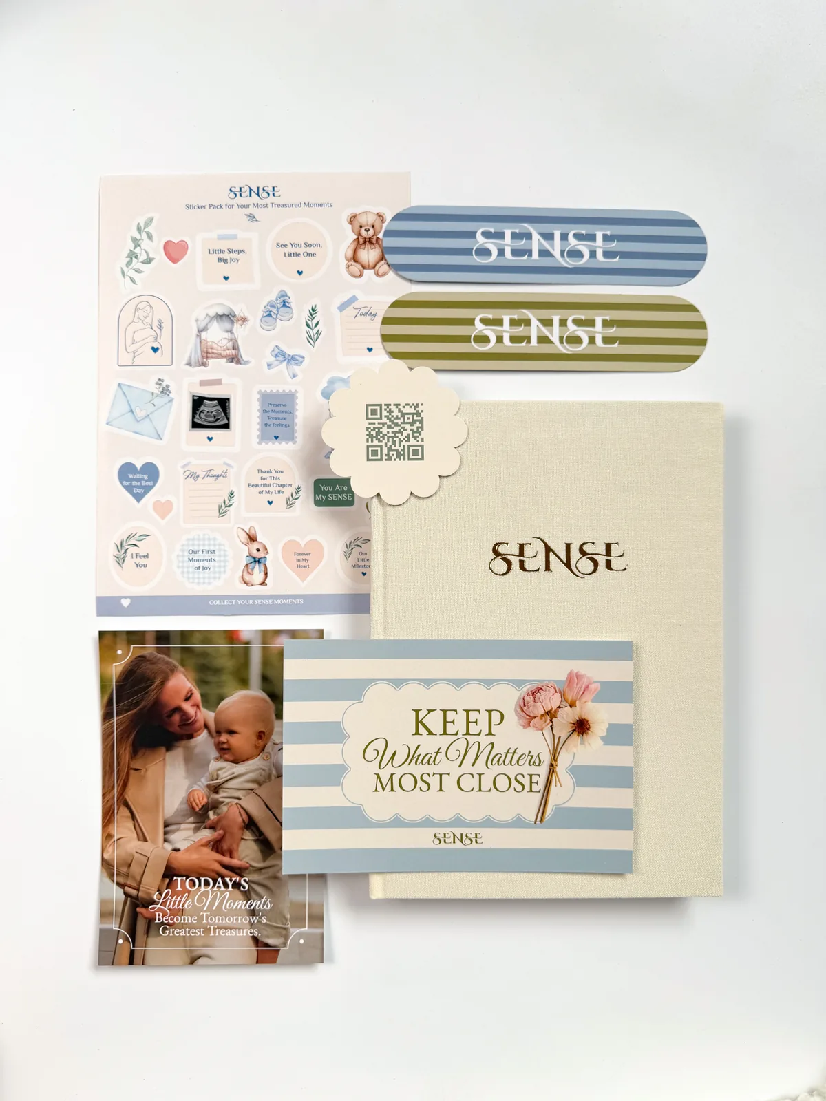 Cream English-edition baby memory book with stickers, bookmarks and a card