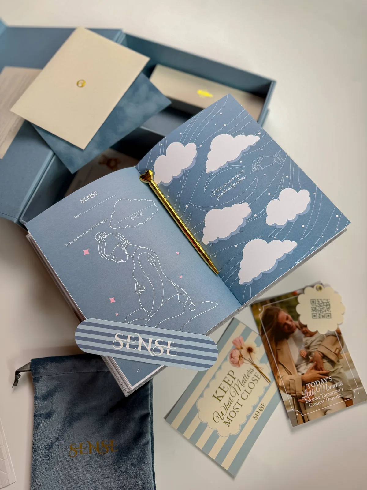 English-edition pregnancy journal, the pouch and cards from the light-blue box